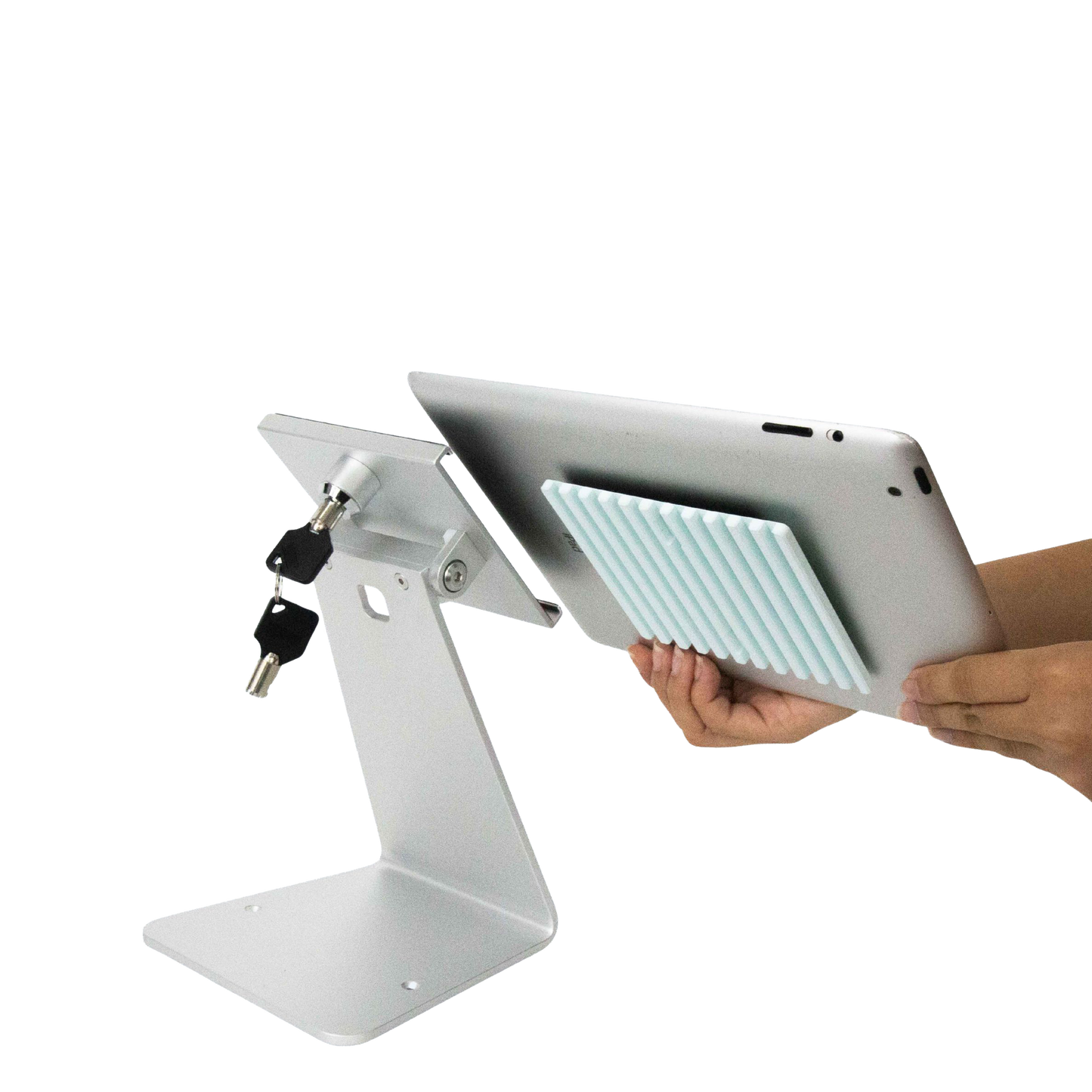 Person holding a tablet with a stand on a white background