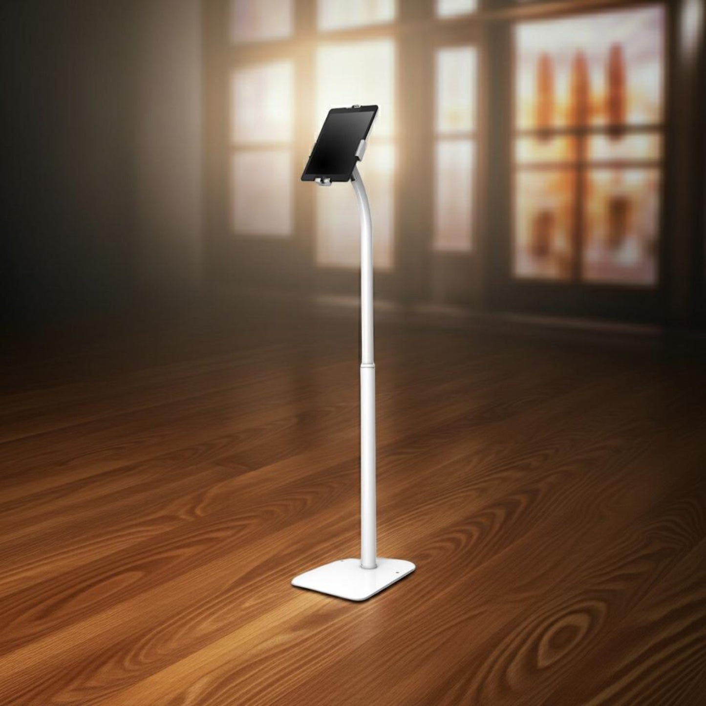 TechnoMounts adjustable anti-theft tablet floor stand displayed in modern interior lighting